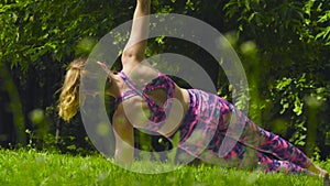 Young woman doing yoga exercises