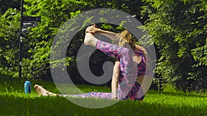 Young woman doing yoga exercises