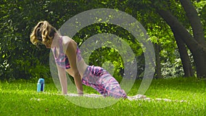 Young woman doing yoga exercises