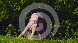 Young woman doing yoga exercises