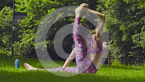 Young woman doing yoga exercises