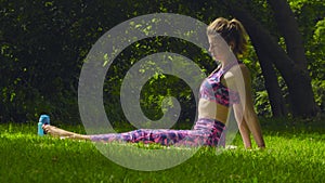 Young woman doing yoga exercises