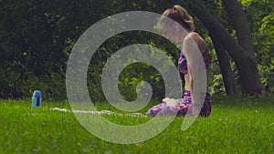 Young woman doing yoga exercises