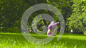 Young woman doing yoga exercises