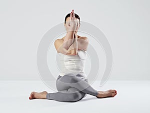 Young woman doing yoga exercises.healthy fit sport girl