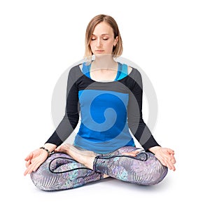 Young woman doing yoga practice isolated on white background. Concept of healthy life and natural balance between body and mental