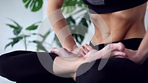 Young woman doing yoga workout at home