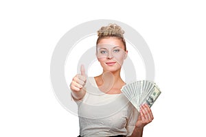 Young woman with dollar notes in her hand. Isolated on white background