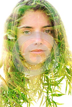 Young woman double exposure portrait with leaves