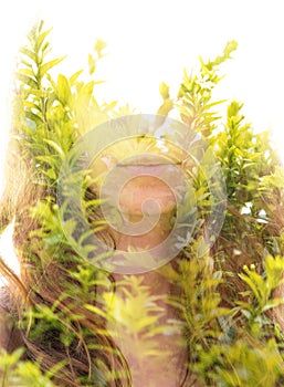Young woman double exposure portrait with leaves
