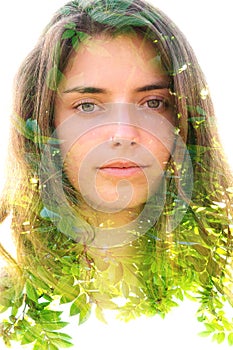 Young woman double exposure portrait with leaves