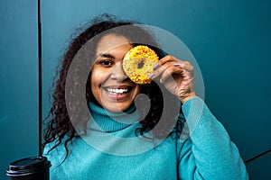Young woman with doughnut