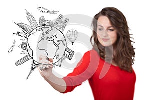Young woman drawing a globe on whiteboard