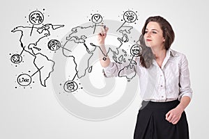 Young woman drawing a social map on whiteboard