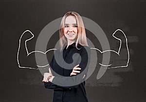 Young woman with drawn powerful hands