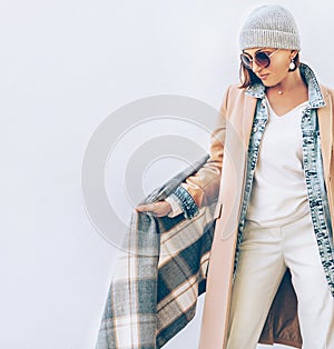 Young Woman dressed in multilayered autumn outfit photo