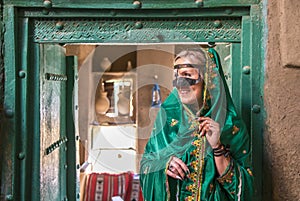 Young woman dressed in traditional omani dress