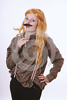 Young woman dressed up as a man with fake moustache