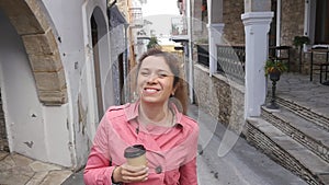 Young woman drink coffee outdoors