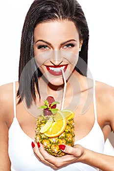 Young woman drink pineapple juice