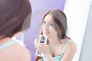 Young woman drink water
