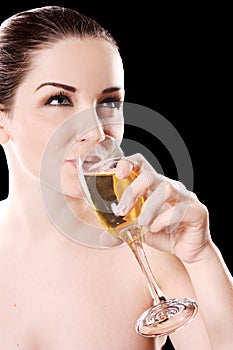 Young woman drinking champagne