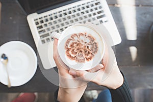 Young Woman Drinking Coffee