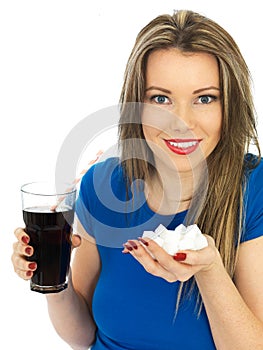 Young Woman Drinking High Sugar Fizzy Drink