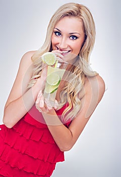 Young woman drinking lemonade
