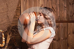 Young woman drinking milk