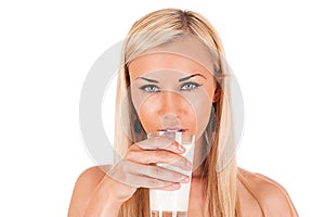 Young woman drinking milk