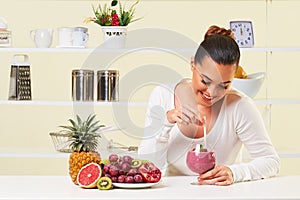 Young woman drinking a smoothie fruit drink health delicious sip weight loss diet