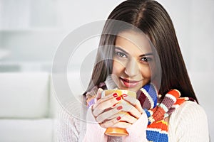 Young woman drinking tea