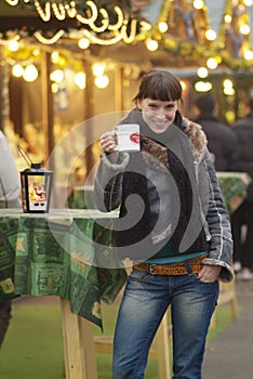 Young woman drinks glogg