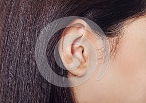Young woman ear closeup