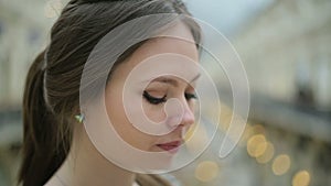 Young woman eating chocolate bar