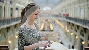 Young woman eating chocolate bar