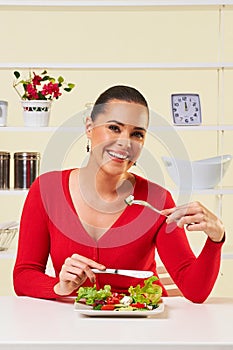 Young woman eating diet salad plate healthy weight loss food