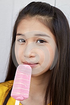 Young woman eating ice cream  outdoor