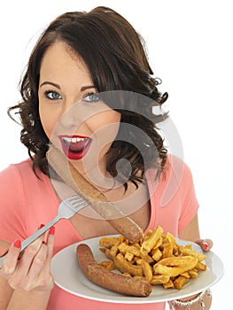 Young Woman Eating Jumbo Sausage and Chips