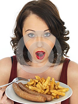 Young Woman Eating Jumbo Sausage and Chips