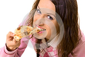 Young woman eating pizza