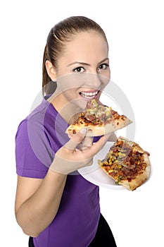 Young woman eating pizza