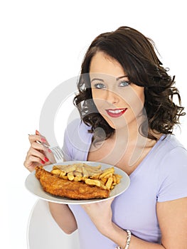 Young Woman Eating Traditional Fish and Chips