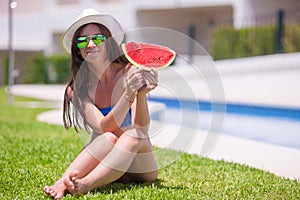 Young woman eating with watermelon relaxing