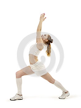 Young woman is engaged in fitness and yoga. Studio shot on white background