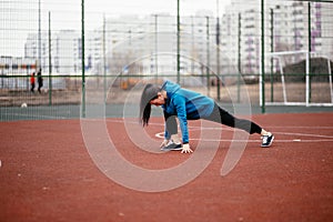 A young woman is engaged in sports on the Playground