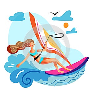 Young woman engaged in windsurfing in sea or ocean photo