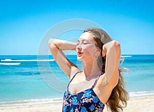 Young woman enjoing the sunlight