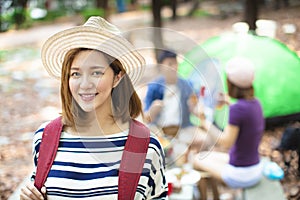 Young  woman  enjoy barbecue and camping